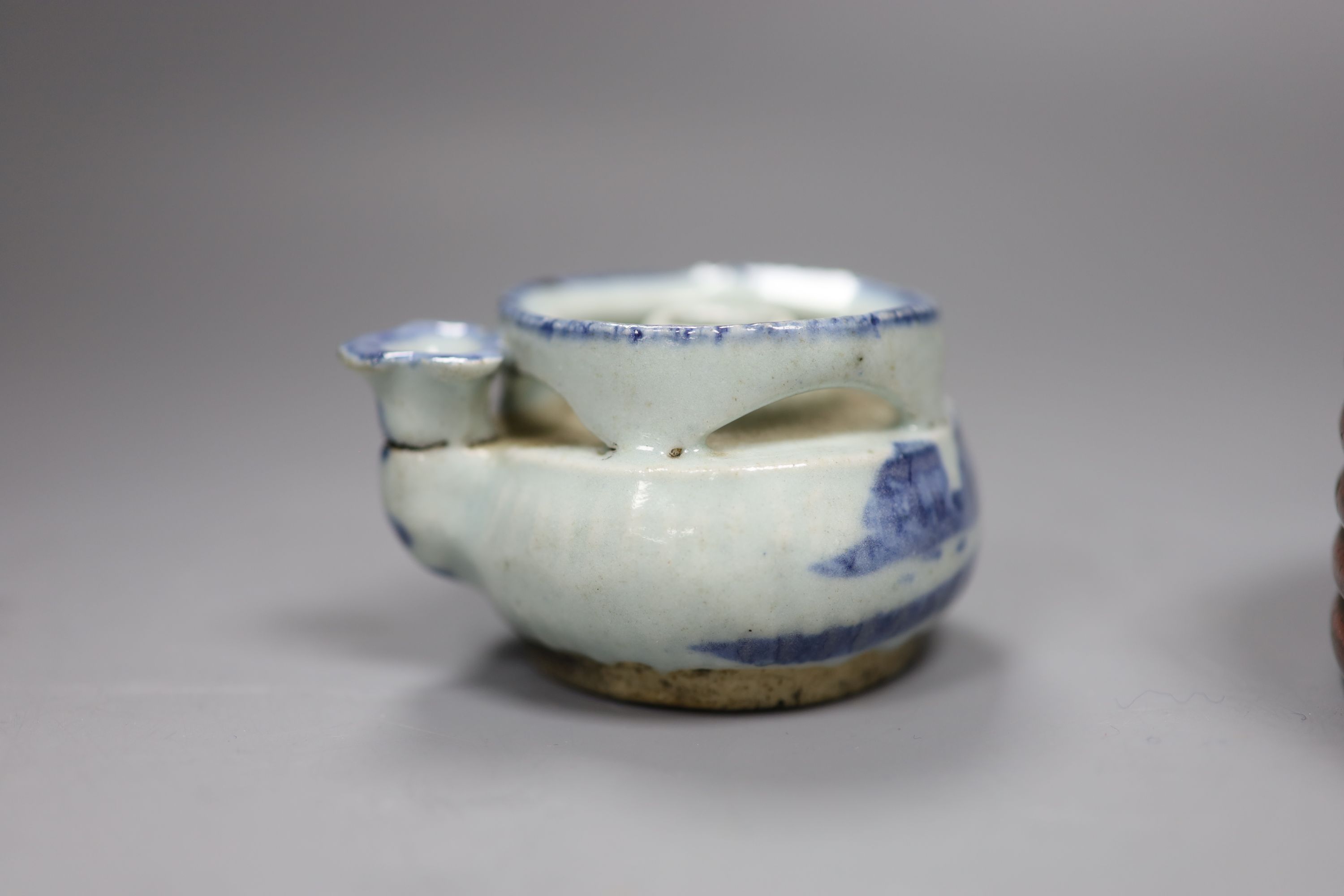 A Chinese red lacquer lidded box, diameter 12.5cm, and a blue and white water dropper